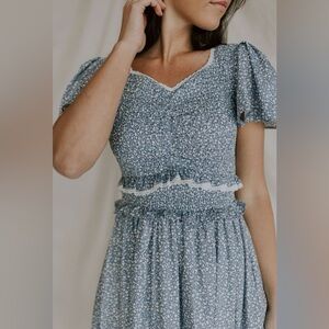 Shop Henly Leia n Co blue ditsy floral dress smocked M